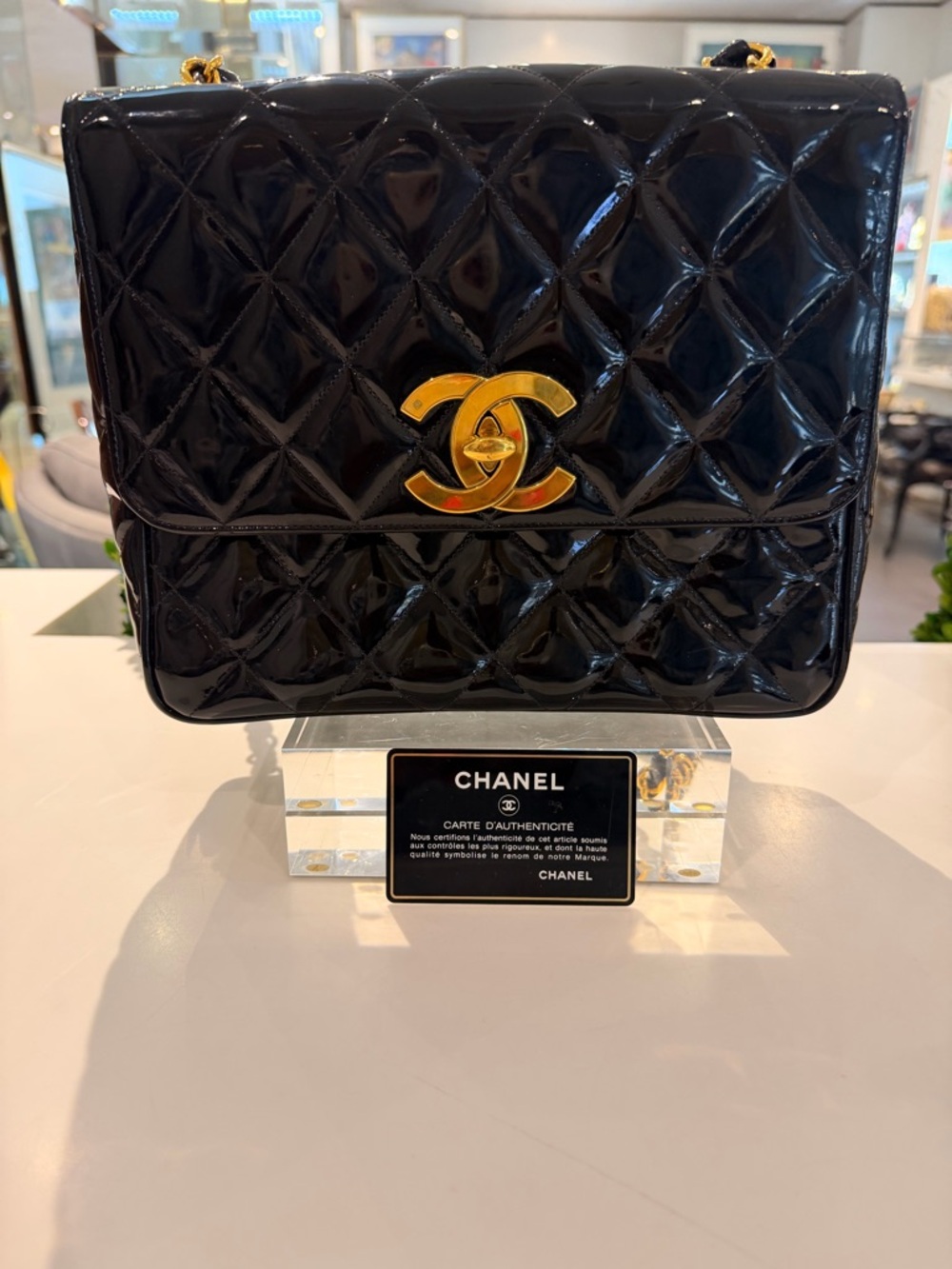 CHANEL Black Quilted Patent Leather Shoulder Bag with Gold Hardware